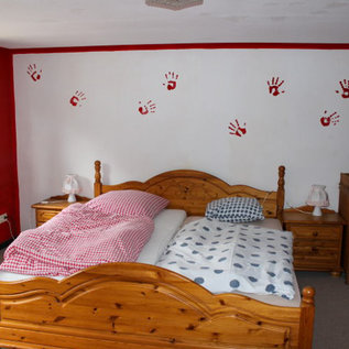 Schlafzimmer mit Doppelbett